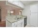 Kitchen with stainless steel appliances, white cabinetry, granite countertops, and a breakfast bar at 2120 River Heights Se Walk, Marietta, GA 30067