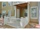 Cozy outdoor patio area with white railing and direct access to the building's exterior and utility access at 2120 River Heights Se Walk, Marietta, GA 30067