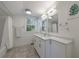 Bathroom with double sinks, stylish tile floor, and a shower/tub combo at 2840 Alpine Rd, Atlanta, GA 30305