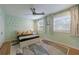 Charming bedroom with light green walls and two windows at 2840 Alpine Rd, Atlanta, GA 30305