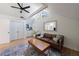 Living room features a vaulted ceiling, large windows, and hardwood floors at 2840 Alpine Rd, Atlanta, GA 30305