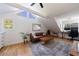 Living room features a vaulted ceiling, large windows, and hardwood floors at 2840 Alpine Rd, Atlanta, GA 30305