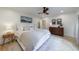 Bright main bedroom featuring a ceiling fan, hardwood floors and neutral decor at 2840 Alpine Rd, Atlanta, GA 30305