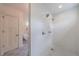 Spacious shower with dual shower heads next to a bathroom featuring a soaking tub at 2840 Alpine Rd, Atlanta, GA 30305