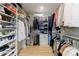 Spacious walk-in closet featuring custom shelving, drawers, and ample storage space at 2840 Alpine Rd, Atlanta, GA 30305