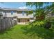 Well-maintained backyard with lush grass and a privacy fence at 5679 Windfall Ln, Lithonia, GA 30058