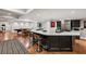 Entertain with ease in this basement featuring a bar area with stainless steel appliances, seating and entertaining space at 105 Kingston Mnr, Atlanta, GA 30342