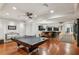 Entertain in this spacious basement with ping pong table, bar area, and ample room for gatherings and recreation at 105 Kingston Mnr, Atlanta, GA 30342