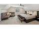 Cozy bedroom with seating area, a ceiling fan, and soft, neutral tones at 105 Kingston Mnr, Atlanta, GA 30342
