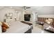 Large bedroom with a seating area, TV, and plenty of natural light at 105 Kingston Mnr, Atlanta, GA 30342