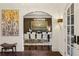 Dining room view from the foyer shows a table with seating for six, brick floors, and neutral walls at 105 Kingston Mnr, Atlanta, GA 30342