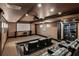 Home theater with a large screen, tiered seating, a projector, and equipment rack at 105 Kingston Mnr, Atlanta, GA 30342