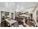 Open kitchen with double islands, breakfast bar, and seamless transition to dining and entertaining spaces at 105 Kingston Mnr, Atlanta, GA 30342
