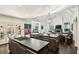 Bright, open kitchen with double islands, modern appliances, and views to the dining and living spaces at 105 Kingston Mnr, Atlanta, GA 30342