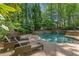 Resort-style pool with stone accents, slide and plenty of room for relaxation at 105 Kingston Mnr, Atlanta, GA 30342