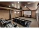 Luxurious theater room with tiered seating, projector, and large screen for the ultimate entertainment experience at 105 Kingston Mnr, Atlanta, GA 30342