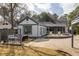 Cozy back patio with outdoor seating and fire pit, perfect for entertaining at 27 Spence Ne Ave, Atlanta, GA 30317