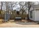 Backyard seating area with fence and partial view of house at 27 Spence Ne Ave, Atlanta, GA 30317