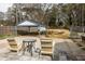 Outdoor space with stone patio, covered parking, and garden area at 27 Spence Ne Ave, Atlanta, GA 30317