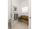 Bright bathroom with charming bench, glass block window and patterned floors at 27 Spence Ne Ave, Atlanta, GA 30317