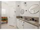 Charming bathroom with double vanity, patterned floors, and stylish fixtures at 27 Spence Ne Ave, Atlanta, GA 30317