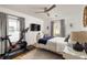This bedroom features a comfortable bed, Peloton, and natural light at 27 Spence Ne Ave, Atlanta, GA 30317