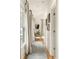Inviting hallway with hardwood floors, natural light, and decorative accents at 27 Spence Ne Ave, Atlanta, GA 30317