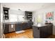 Modern kitchen boasts stainless steel appliances, granite countertops, and updated cabinetry at 27 Spence Ne Ave, Atlanta, GA 30317
