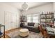 Comfortable home office with natural light, hardwood floors, and ample storage at 27 Spence Ne Ave, Atlanta, GA 30317