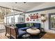 Comfortable screened porch featuring seating, ceiling fan, and access to the backyard at 27 Spence Ne Ave, Atlanta, GA 30317