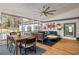Relaxing screened porch with dining and sitting areas, ceiling fan, and views of the backyard at 27 Spence Ne Ave, Atlanta, GA 30317