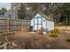 Backyard storage shed perfect for gardening equipment and extra storage space at 27 Spence Ne Ave, Atlanta, GA 30317
