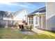 Private backyard with a patio dining set, perfect for outdoor gatherings and relaxation at 4924 Antelope Cv, Atlanta, GA 30349