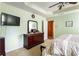 Comfortable main bedroom with modern decor, ceiling fan, and natural light at 4924 Antelope Cv, Atlanta, GA 30349