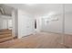 Basement area features wood-look flooring, mini-split system, and access to a tiled bathroom at 5000 Northland Sw Rd, Mableton, GA 30126