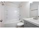Bathroom with a tub/shower, gray vanity, and neutral-colored walls at 5000 Northland Sw Rd, Mableton, GA 30126