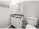 Cozy bathroom with vanity, granite countertop, mirror, and toilet at 7060 Steel Wood Nw Dr, Kennesaw, GA 30152