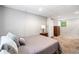 Bedroom with neutral paint, plush carpet, and a cozy atmosphere at 7060 Steel Wood Nw Dr, Kennesaw, GA 30152