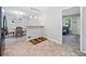 Bright dining area with convenient bar and easy access to the kitchen and the living room at 7060 Steel Wood Nw Dr, Kennesaw, GA 30152