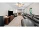 Bright living room with stone fireplace, new carpet, and lots of natural light at 7060 Steel Wood Nw Dr, Kennesaw, GA 30152