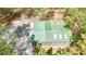Aerial view of the home showing the metal roof and wooded surroundings at 175 Flat Creek Ct, Fayetteville, GA 30214