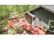 Spacious back deck, perfect for entertaining, with comfortable seating and dining area at 175 Flat Creek Ct, Fayetteville, GA 30214