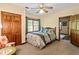 Cozy bedroom features a double bed, closet and windows, offering plenty of natural light and storage space at 175 Flat Creek Ct, Fayetteville, GA 30214