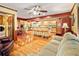 Expansive living area with wood floors, a kitchen island, and a comfortable seating arrangement at 175 Flat Creek Ct, Fayetteville, GA 30214