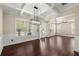Expansive living room featuring wood floors, decorative ceilings, and lots of natural light at 2238 Well Springs Dr, Buford, GA 30519