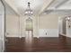 Spacious living room featuring dark wood floors, neutral walls, and stylish trim at 2238 Well Springs Dr, Buford, GA 30519