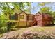 Charming backyard with a cozy deck attached to a yellow house, perfect for outdoor living at 2261 Byron Sw Ct, Marietta, GA 30064