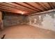 Spacious unfinished basement with concrete walls, exposed ceiling, and potential for customization at 2261 Byron Sw Ct, Marietta, GA 30064