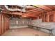 Unfinished basement with exposed ceiling and concrete walls, offering customization possibilities at 2261 Byron Sw Ct, Marietta, GA 30064
