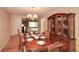 Dining room with hardwood floors, a chandelier, and an adjacent living room with a seamless transition at 2261 Byron Sw Ct, Marietta, GA 30064